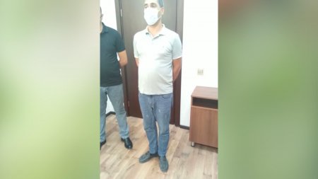 Polis postunda saxlanılan şəxsin avtomobilində heroin aşkarlanıb